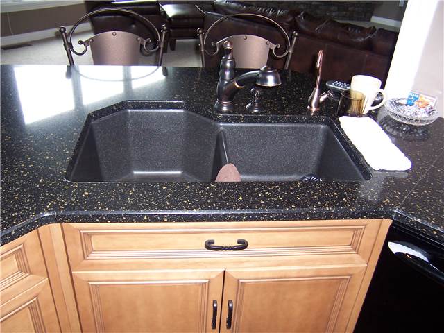 Quartz countertop with a composite undermount sink
